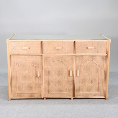 Lot 485 - A modern wicker sideboard, with a glass inset top