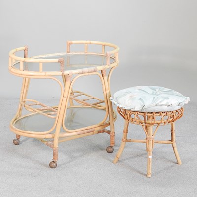 Lot 676 - A bamboo tea trolley with glass shelves, 80cm...