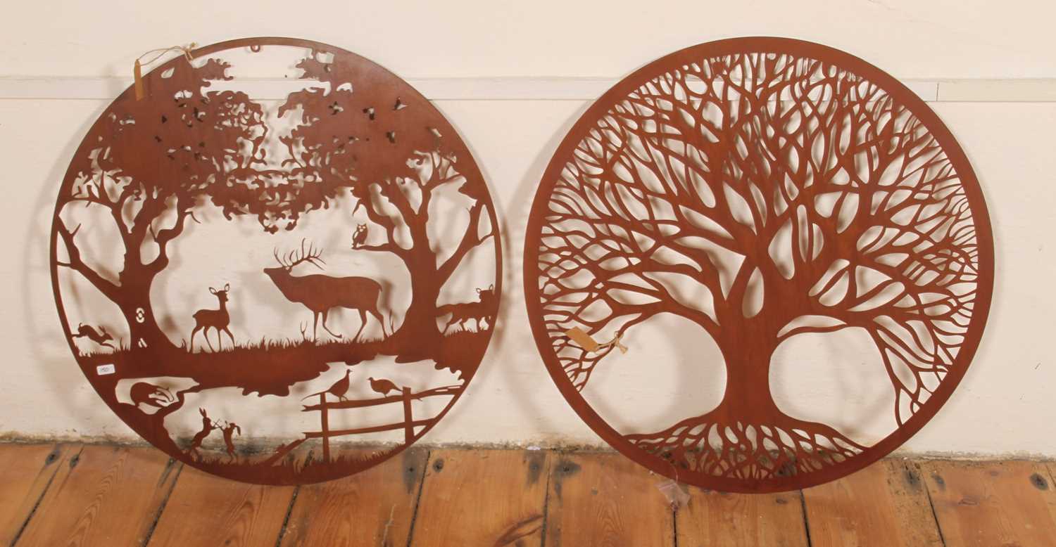 Lot 538 - A rusted metal circular cut-out garden panel,