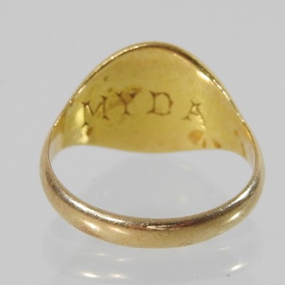 Lot 2 - A child's 18 carat gold signet ring