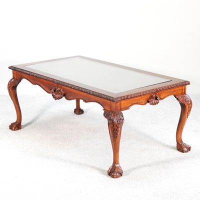 Lot 305 - A carved hardwood coffee table, with an inset...