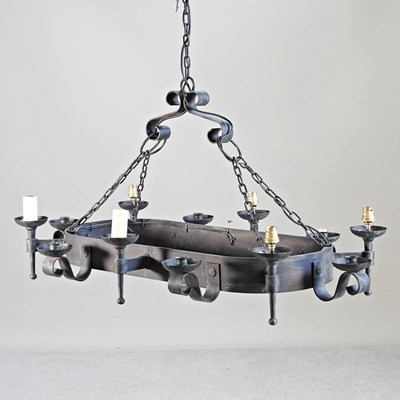 Lot 321 - A large wrought iron ceiling light, with...