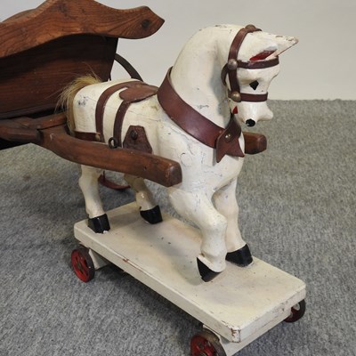 Lot 56 - A 20th century children's pull-along model horse and cart