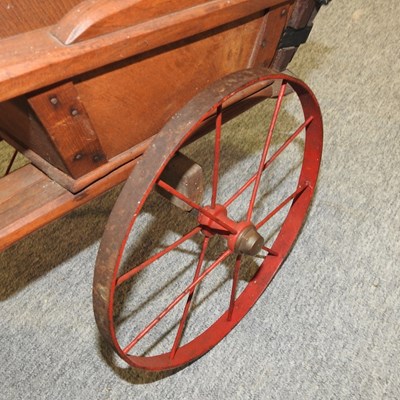 Lot 56 - A 20th century children's pull-along model horse and cart