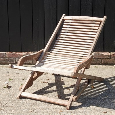 Lot 319 - A teak slatted folding garden chair