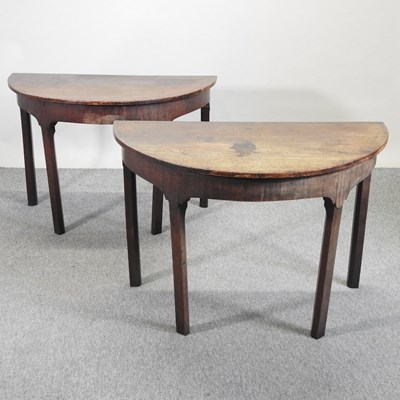 Lot 680 - A pair of George III mahogany D end side tables