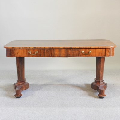 Lot 600 - A 19th century rosewood library table, on...