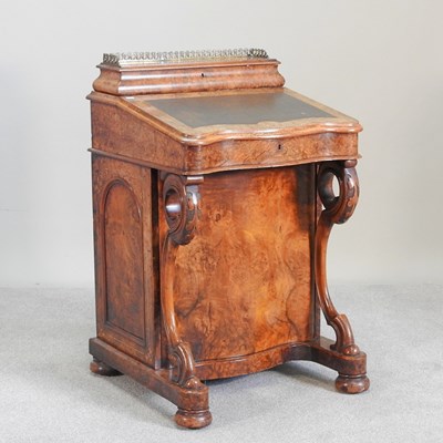 Lot 622 - A Victorian burr walnut davenport, with a...