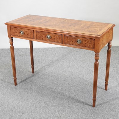 Lot 556 - A hand made burr elm side table