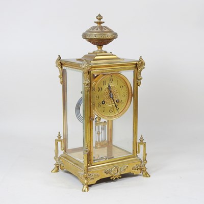 Lot 27 - A 19th century French gilt brass cased four...