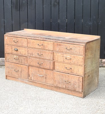 Lot 29 - A mid 20th century oak chest containing an...