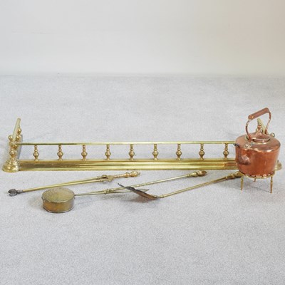 Lot 149 - A brass fender, 134cm wide, together with a...