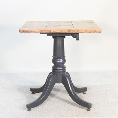 Lot 545 - A rustic grey painted dining table, with a...