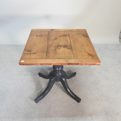 Lot 545 - A rustic grey painted dining table, with a...