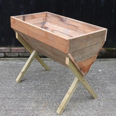 Lot 302 - A wooden garden planter