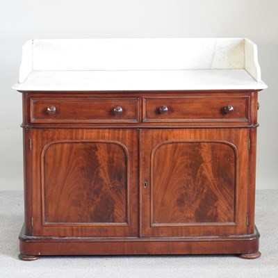 Lot 628 - A 19th century mahogany marble top washstand,...