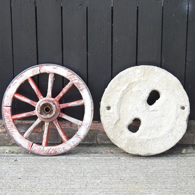 Lot 629 - An old wooden cartwheel, 55cm diameter,...