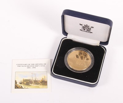Lot 207 - A gold-coloured medal commemorating the...