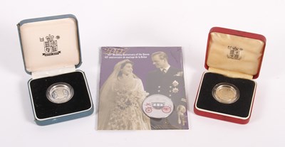 Lot 142 - Two 1983 silver proof one pound coins, cased,...