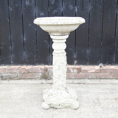 Lot 373 - A cast stone garden bird bath, relief...