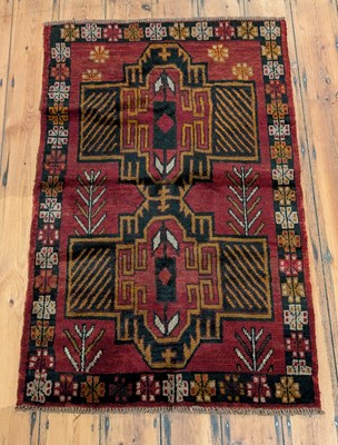 Lot 405 - A Baluchi rug