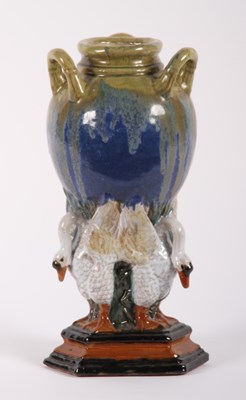 Lot 582 - An early 20th century glazed earthenware vase,...