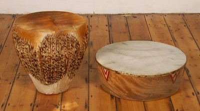 Lot 640 - An African deerskin rawhide drum, together...