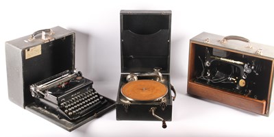 Lot 430 - A vintage gramophone, sewing machine, and...