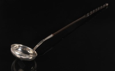 Lot 198 - A Georgian Scottish silver toddy ladle, with...
