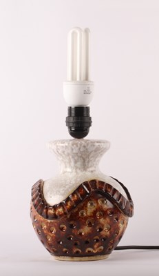 Lot 687 - A West German pottery table lamp