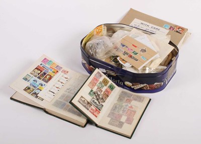 Lot 216 - A varied stamp collection, including loose...