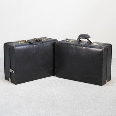 Lot 587 - A pair of black leather cases 66 x 44cm (2)