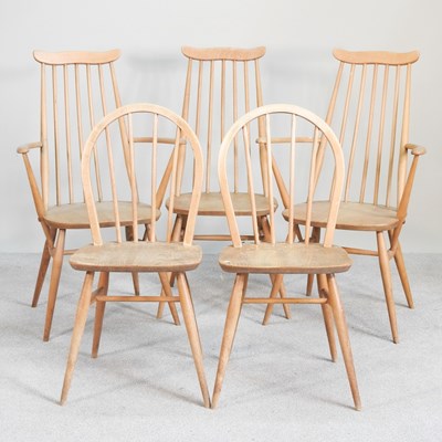 Lot 30 - A pair of Ercol light elm hoop back dining...