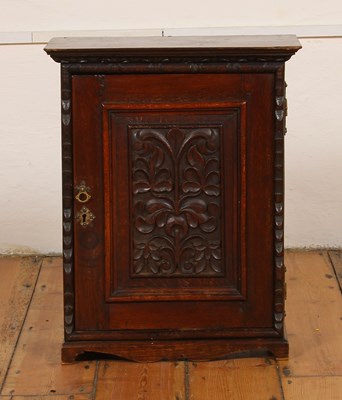 Lot 331 - A 19th century oak pigeonhole cabinet, with...