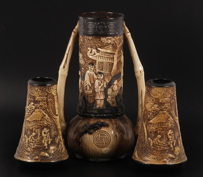 Lot 609 - A pair of Bretby oriental-ware vases, together...