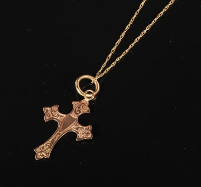 Lot 160 - A 9 carat yellow gold crucifix pendant and...