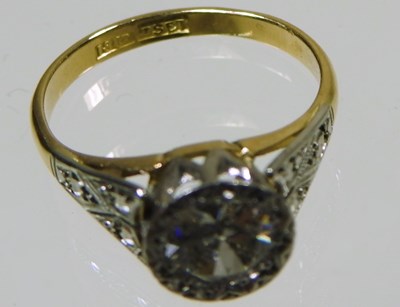 Lot 45 - An 18 carat gold illusion set diamond halo...