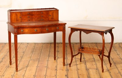 Lot 524 - A reproduction mahogany desk, having a leather...