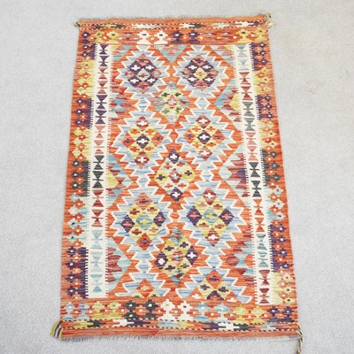 Lot 226 - A Persian kilim rug, with hooked diamonds, 168...