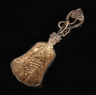 Lot 24 - An Elizabeth II cast silver caddy spoon,...