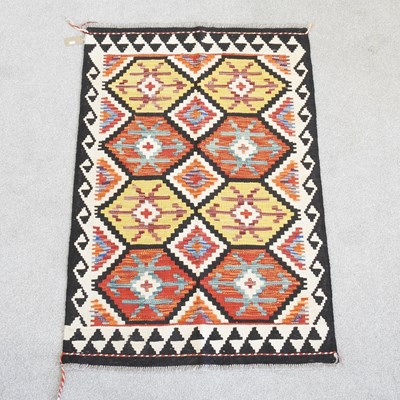 Lot 657 - A Persian kilim rug, with hexagonal designs,...