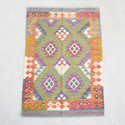 Lot 531 - A kilim rug, with coloured designs, 145 x 100cm