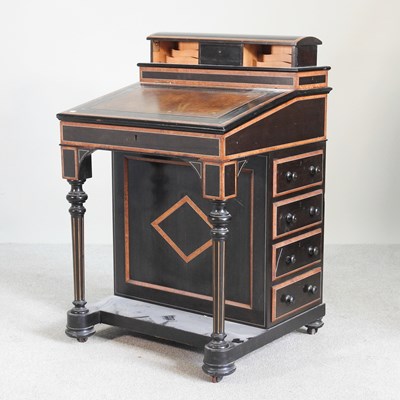Lot 195 - A Victorian ebonised and amboyna inlaid...