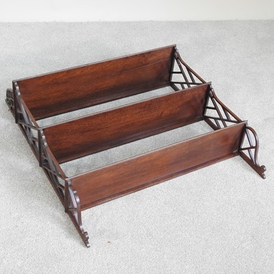 Lot 513 - A 19th century mahogany three tier wall shelf,...