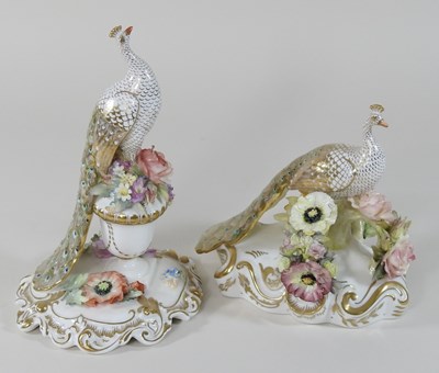Lot 57 - A Royal Crown Derby porcelain model of a peacock