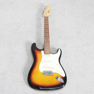 Lot 117 - A Squier Stratocaster electric guitar, with...