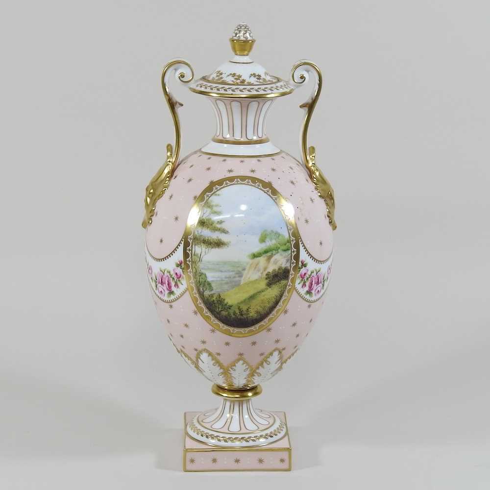 Lot 66 - A Royal Crown Derby limited edition porcelain urn and cover