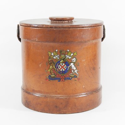 Lot 8 - A leather ice bucket, with armorial decoration...