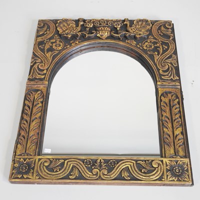 Lot 464 - A modern gilt framed wall mirror, with relief...