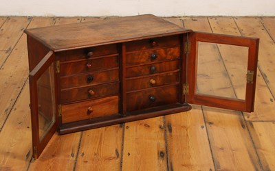 Lot 522 - A mahogany table top collector's chest